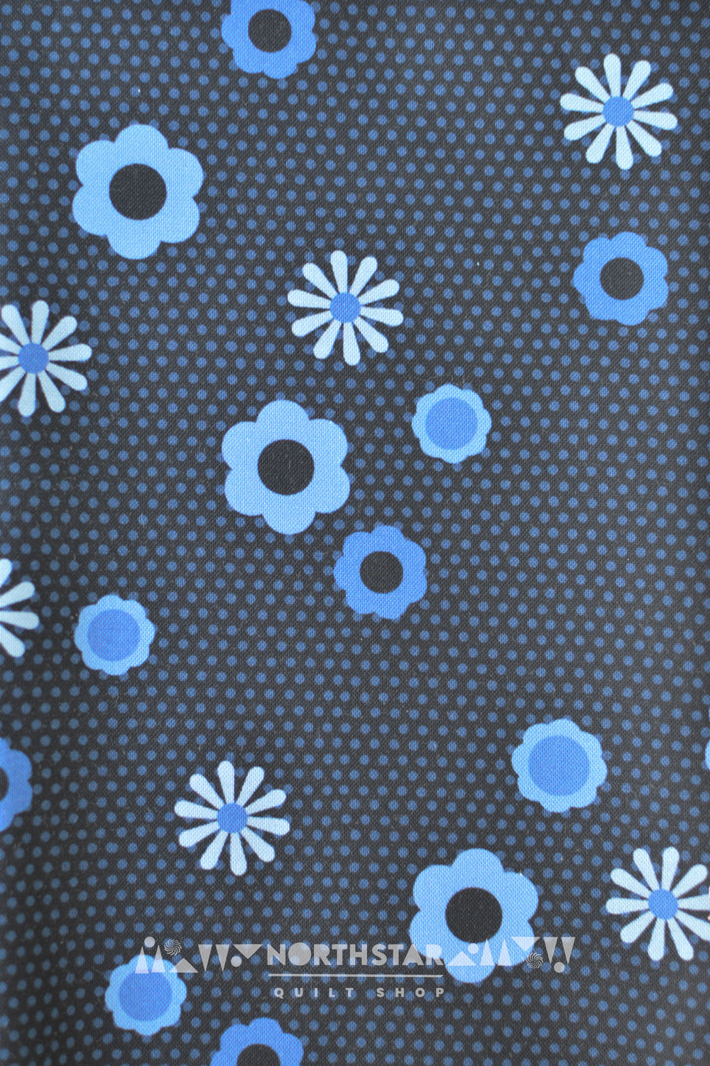 Retro blue flowers on a dotted background. Designed by Libs Elliot for Andover, adds vintage charm to any quilt.