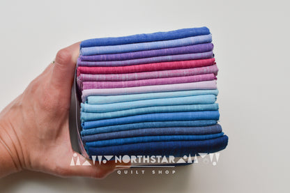 Close-up of Morning Glory woven cotton fabrics showing rich texture and color variation.