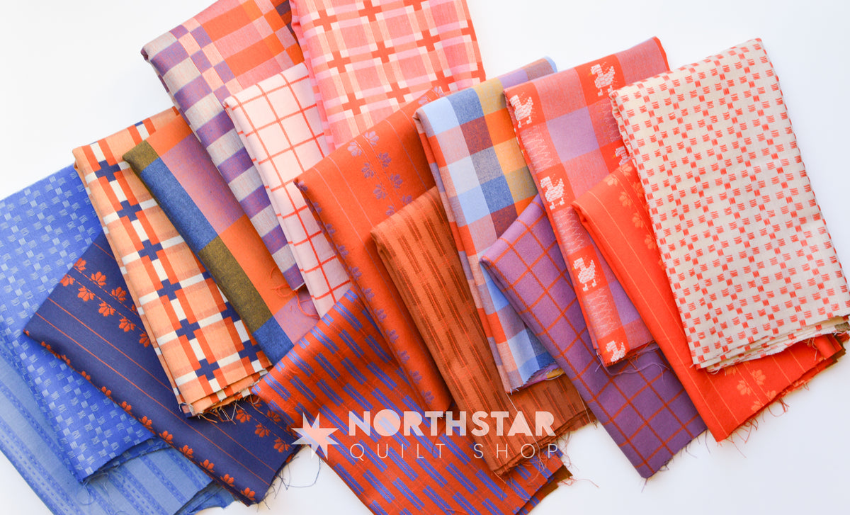 Fine and Dandy woven fabrics by Fableism in terracotta, peach, blue, purple, and neutral tones